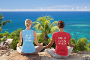 mockup-of-a-couple-wearing-a-tank-top-and-a-t-shirt-while-meditating-by-the-ocean-43877-r-el2