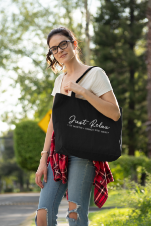 tote-bag-mockup-featuring-a-woman-with-glasses-wearing-ripped-jeans-28836